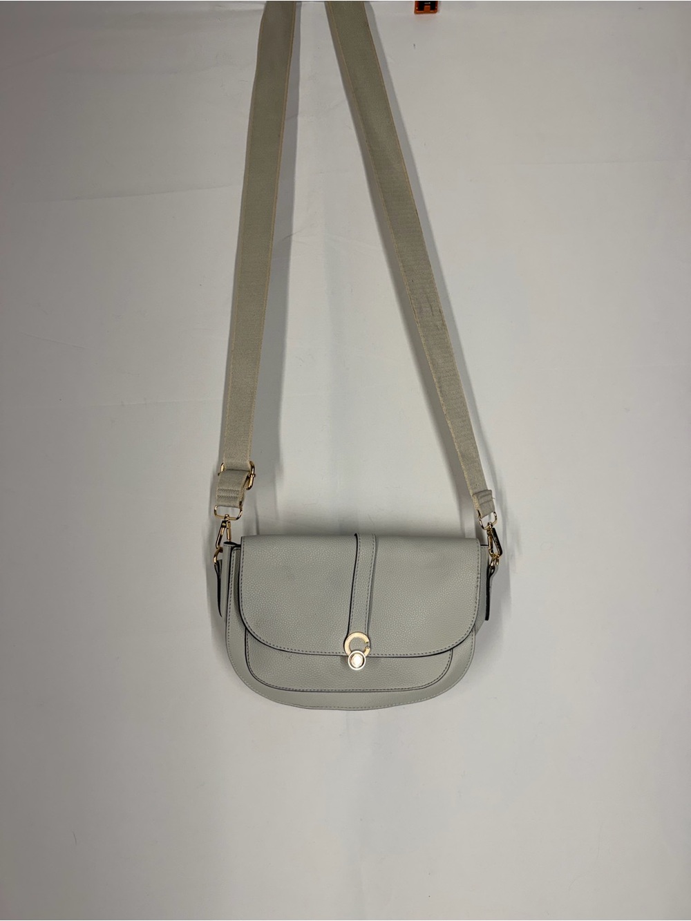 Minimalist Light Gray Crossbody Bag with Gold Accent